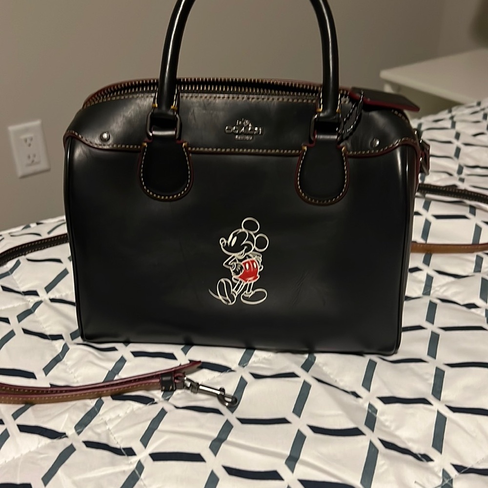 Black coach x Disney handbag. Lightly used. Comes with removable strap.